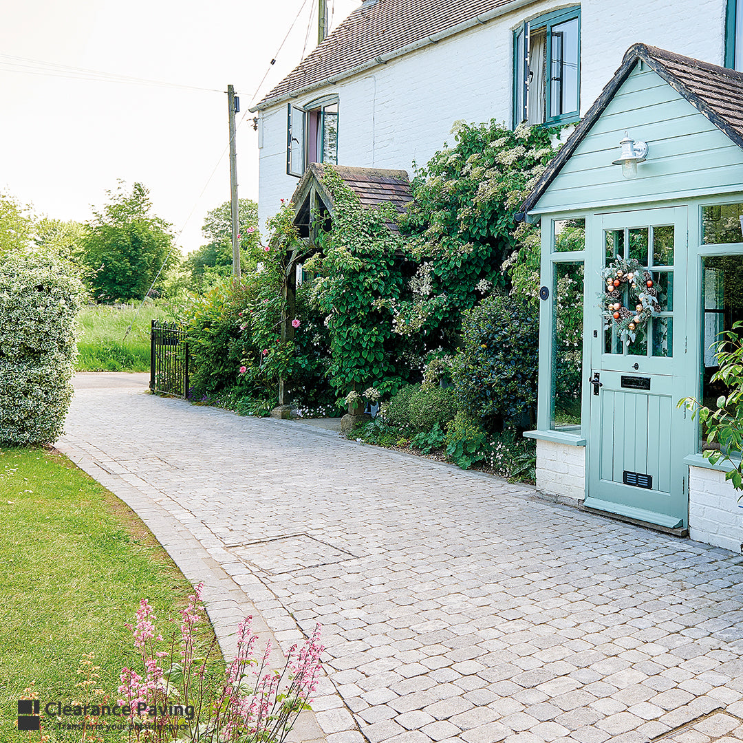 Brett Aura Square Stone driveway against a house in Silver Fleck