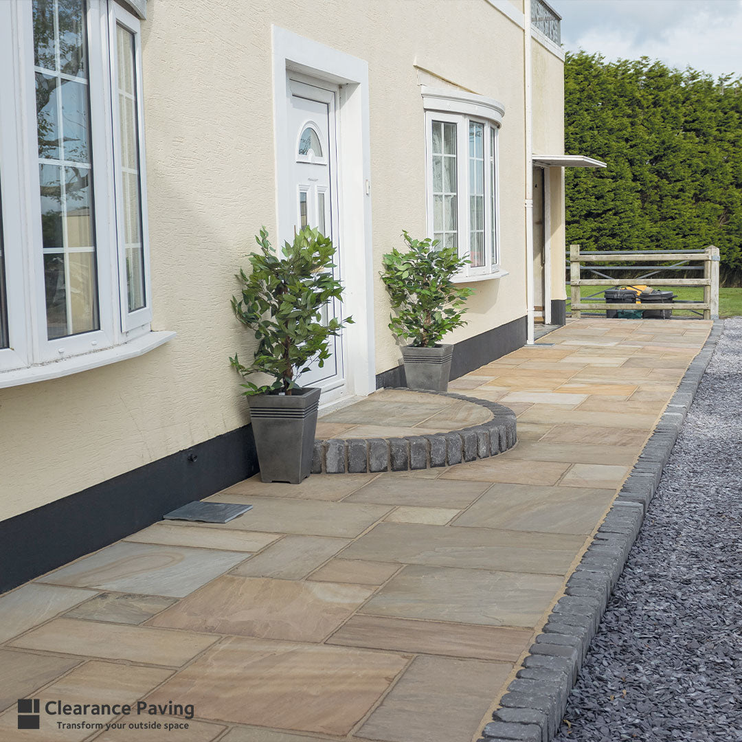 Indian Sandstone patio paving in a mixed pack in Sunrise with a Vintage Kerb edging