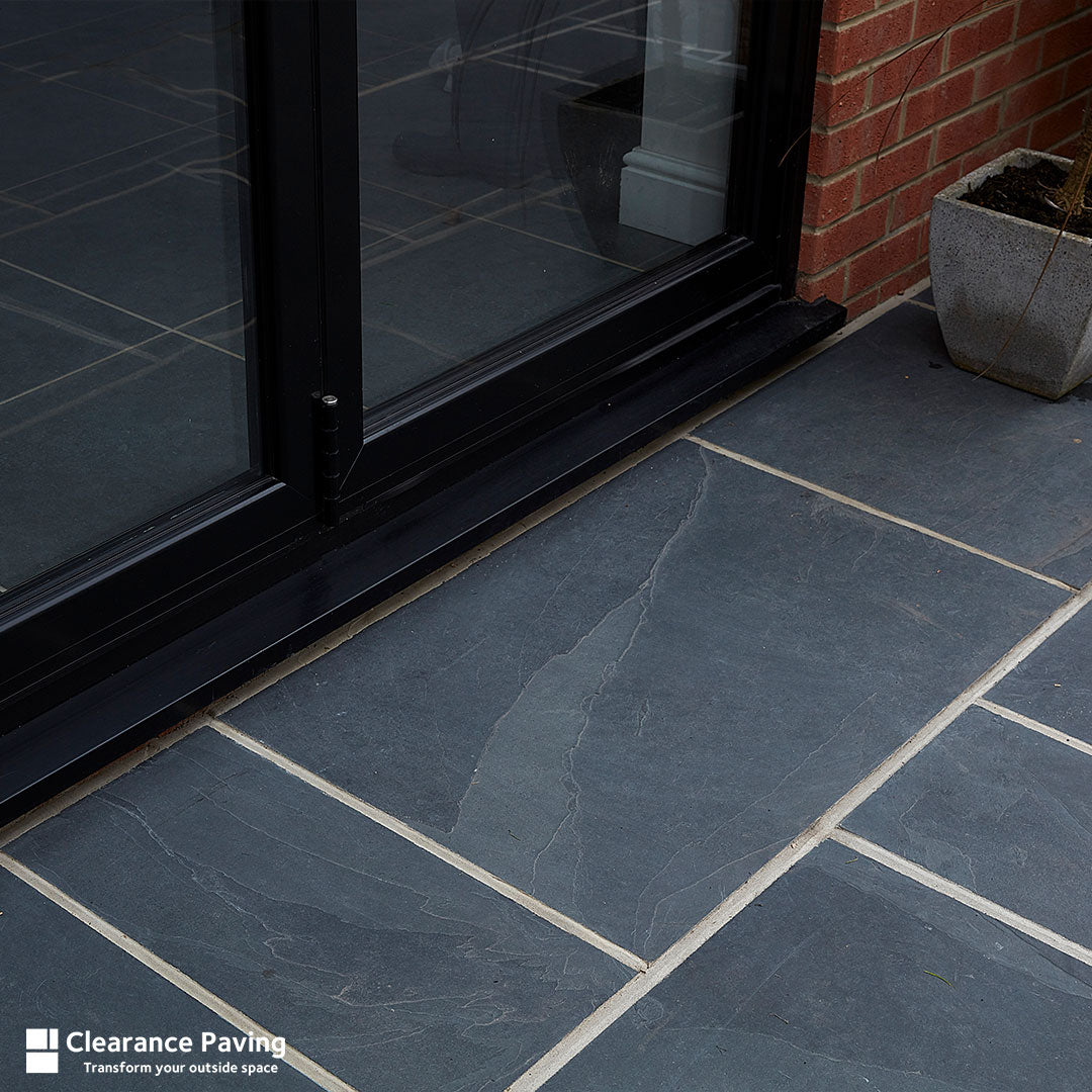 Brett Brazilian Slate paving slabs in Olive Black and mixed sized linear pack