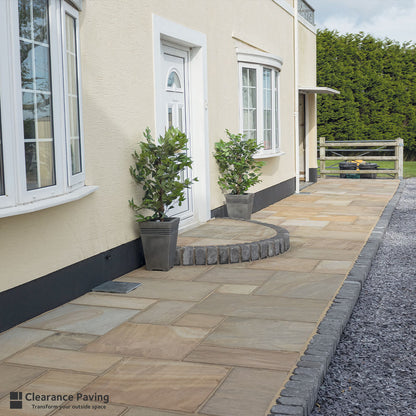 Indian Sandstone patio paving in a mixed pack in Sunrise with a Vintage Kerb edging