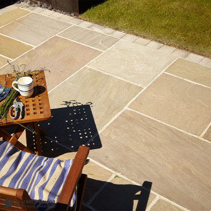 Indian Sandstone square garden patio slabs in Forest Glen in the sun