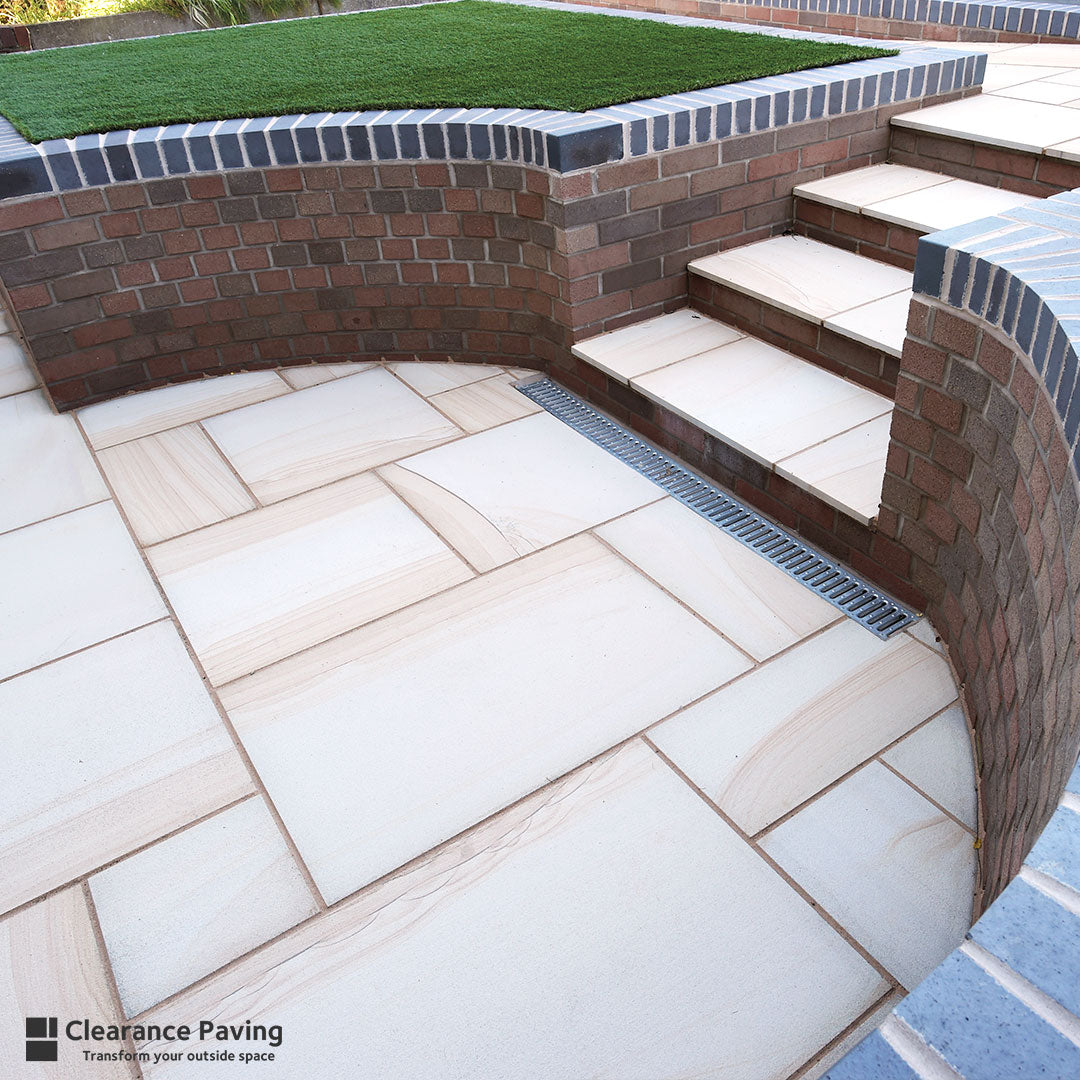 Brett Textured Sandstone paving in Moorland Gold mixed sized pack
